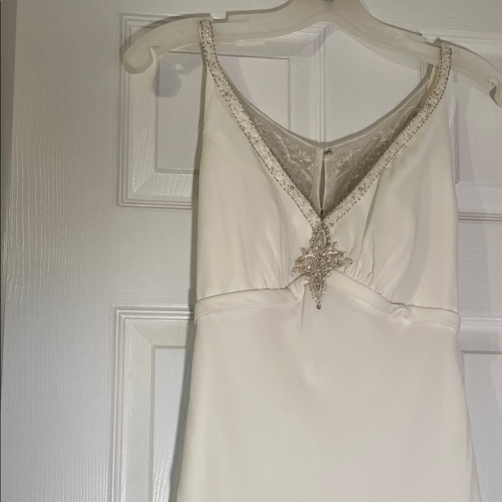 Elegant White Wedding Gown with Crystal Embellishments